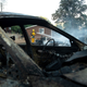 A firefighter mops up hot spots from the Pawnee Fire.